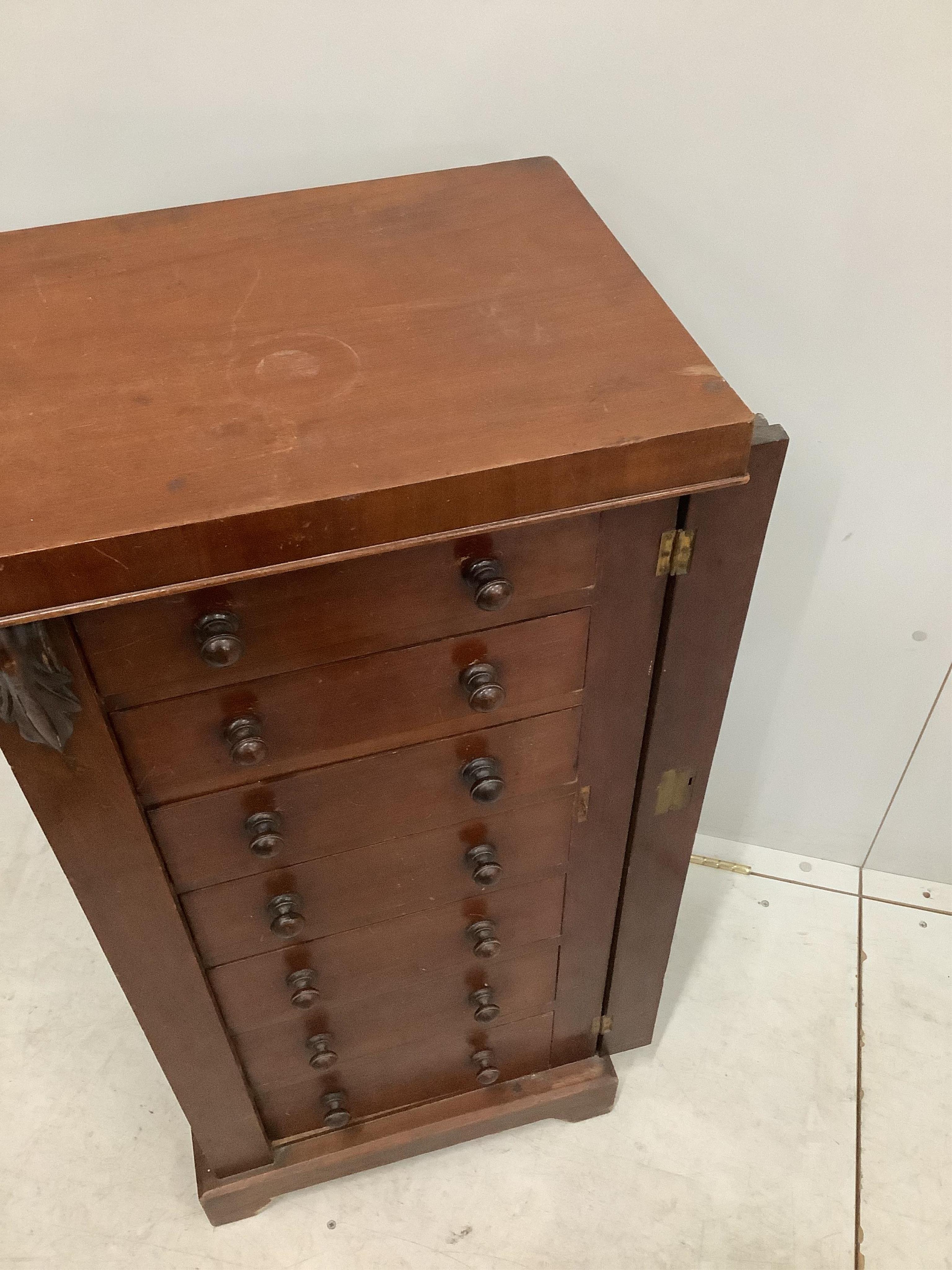 A Victorian mahogany Wellington chest, width 49cm, depth 36cm, height 102cm. Condition - fair